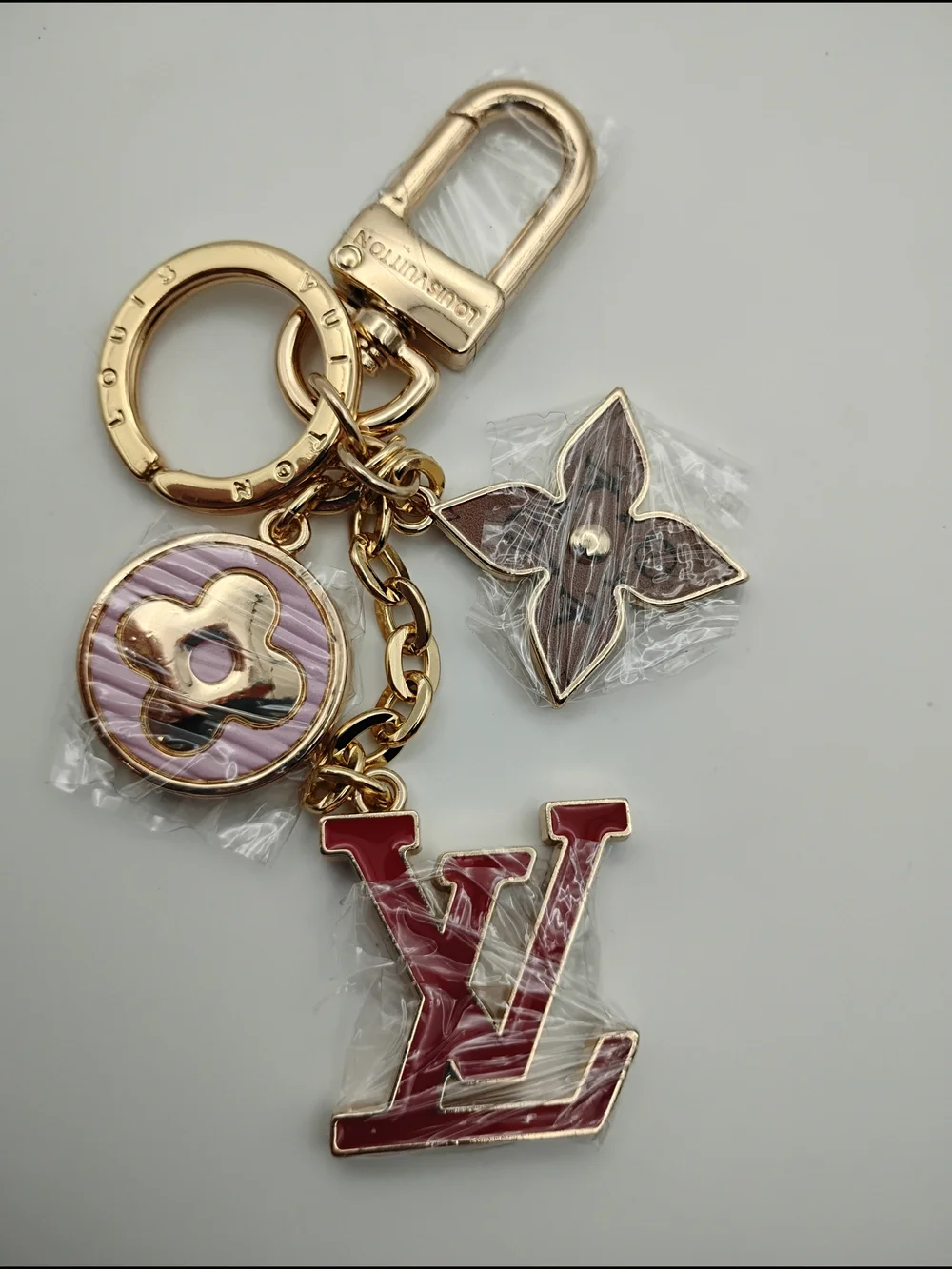 Louis Vuitton Red & Gold-Tone Keychain Charm With Pink and Brown Accents BNWOT